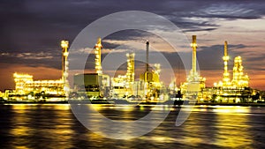 Petroleum oil refinery factory over sunrise