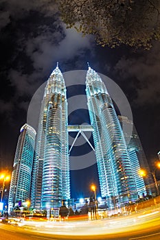 Petronas Twin Towers Illuminated and car light trail (fisheye)