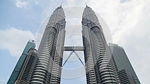 Petronas Twin Towers with rapidly moving clouds time-lapse