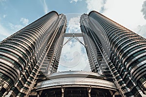 Petronas twin towers viewed from below in Kuala Lumpur, Malaysia