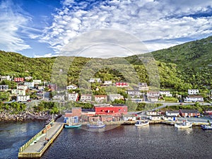 Petty Harbour with two piers during summer sunset, Newfoundland, Canada