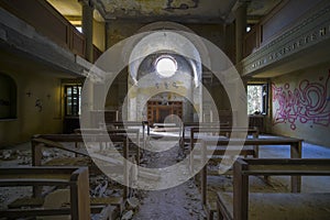 pews in abandoned church