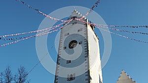 Pfullendorf, Germany. The old tower Oberes part of the ancient medieval fortifications of the city. Small fabric flags waving