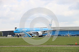 PH-BQL KLM Asia Boeing 777 idle on landing strip Aalsmeerbaan of Amsterdam Schiphol Airport in the Netherlands, parked due to canc