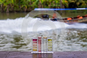 PH Test Kit on swim pool river water inspector