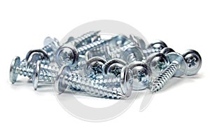 PH tyApe chrome screws on a white background