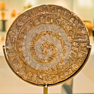Phaestos disk with unknown script exibited at Heraklion archaeology museum, island of Crete