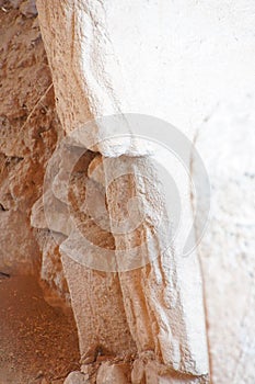 Phallic figures carved on stele
