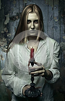Phantom girl with candle photo