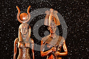 Pharaoh Tutankhamun with the goddess ISIS on a black background. Egyptian history