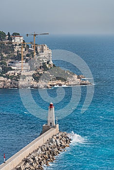 Landmark and architecture: Phare de Nice (Nice Lighthouse) with Port Lympia and Cape the Nice from the Colline du photo