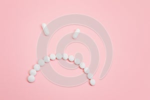 Pharma Harm. Angry Smiley Face Made from White Pills