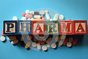 Pharma text in wooden block