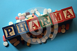 Pharma text in wooden block