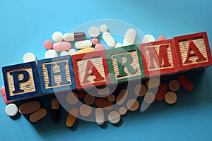 Pharma text in wooden block