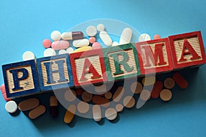 Pharma text in wooden block photo