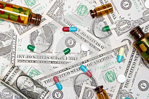 Pharmaceutical and health concept, Antibiotic capsules tablet and brown bottle on dollar background