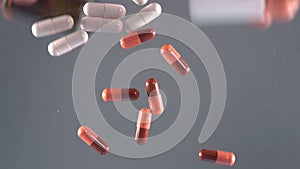 Pharmaceutical industry drugs pills vitamins slow motion