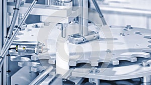 pharmaceutical industry, medicine pills are filling in the plastic bottle on production line machine conveyor