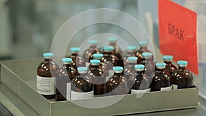 Pharmaceutical industry. Production line machine conveyor at factory with bottles. pharmaceutical production of liquid