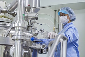 Pharmaceutical Industry Worker At Work In Sterile Environment