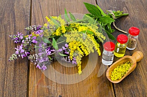 Pharmaceutical tincture, extract of wild herbs, medicinal flowers in medical bottles