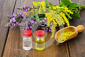 Pharmaceutical tincture, extract of wild herbs, medicinal flowers in medical bottles