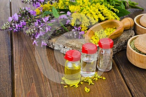 Pharmaceutical tincture, extract of wild herbs, medicinal flowers in medical bottles