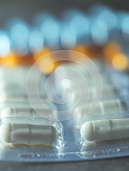 Pharmaceuticals antibiotics pills medicine /colorful antibacterials pills on white background /capsule pill medicine