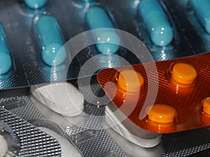 Pharmaceuticals antibiotics pills medicine /colorful antibacterials pills on white background /capsule pill medicine