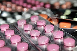 Pharmaceuticals antibiotics tablets capsule in a blister defocused