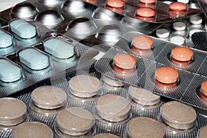 Pharmaceuticals antibiotics tablets capsule in a blister unfocused