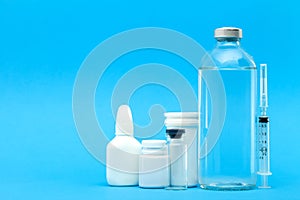 Pharmaceuticals for the treatment of diseases unlabeled plastic and glass bottles.