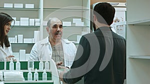 Pharmacist and client have conflict and try to solve the problem at pharmacy