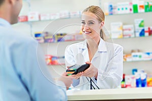 Pharmacist and client at pharmacy