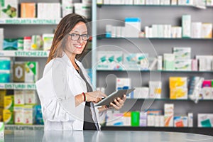 Pharmacist with Digital Tablet photo