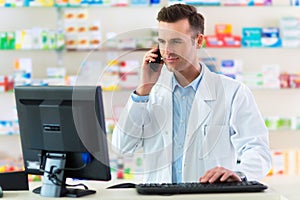 Pharmacist in drugstore photo