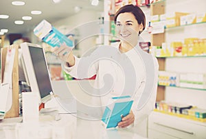 Pharmacist ready to assist in choosing at counter