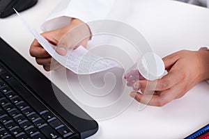 Pharmacist realizing prescription