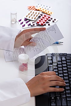 Pharmacist realizing prescription photo