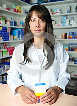 Pharmacist selling medicine