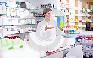 Pharmacist is showing right drug