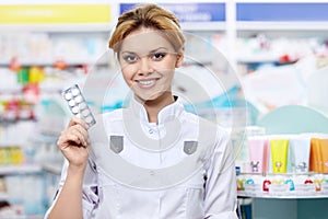 Pharmacist with tablets photo