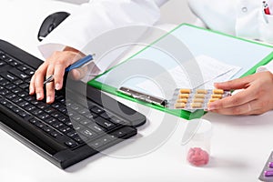 Pharmacist during work in pharmacy