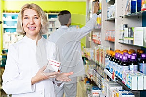 Pharmacists working in modern farmacy