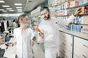 Pharmacists working in the pharmacy store