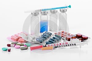 Pharmacology tablets vials syringes photo