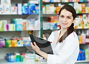 Pharmacy chemist woman in drugstore