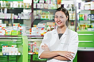 Pharmacy chemist woman in drugstore photo