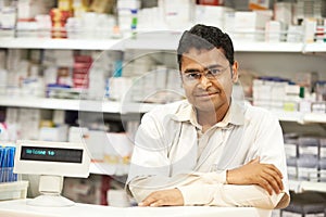 Pharmacy chemist woman in drugstore photo